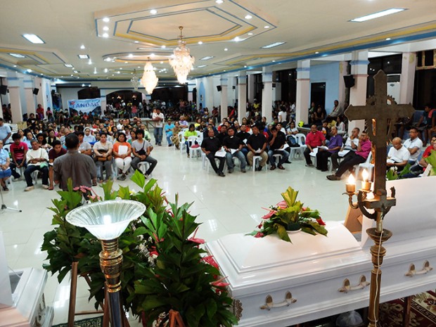 Usually a venue for festive events, the province’s Social Hall kept the remains of three massacre victims for almost a week.  It would later also host a four-year-old evacuee who would die mere hours after this tribute concluded.