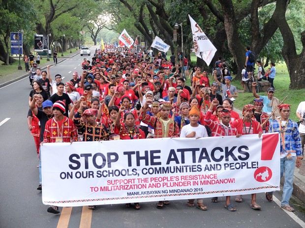 The Lumad as they reach UP's Faculty Center.